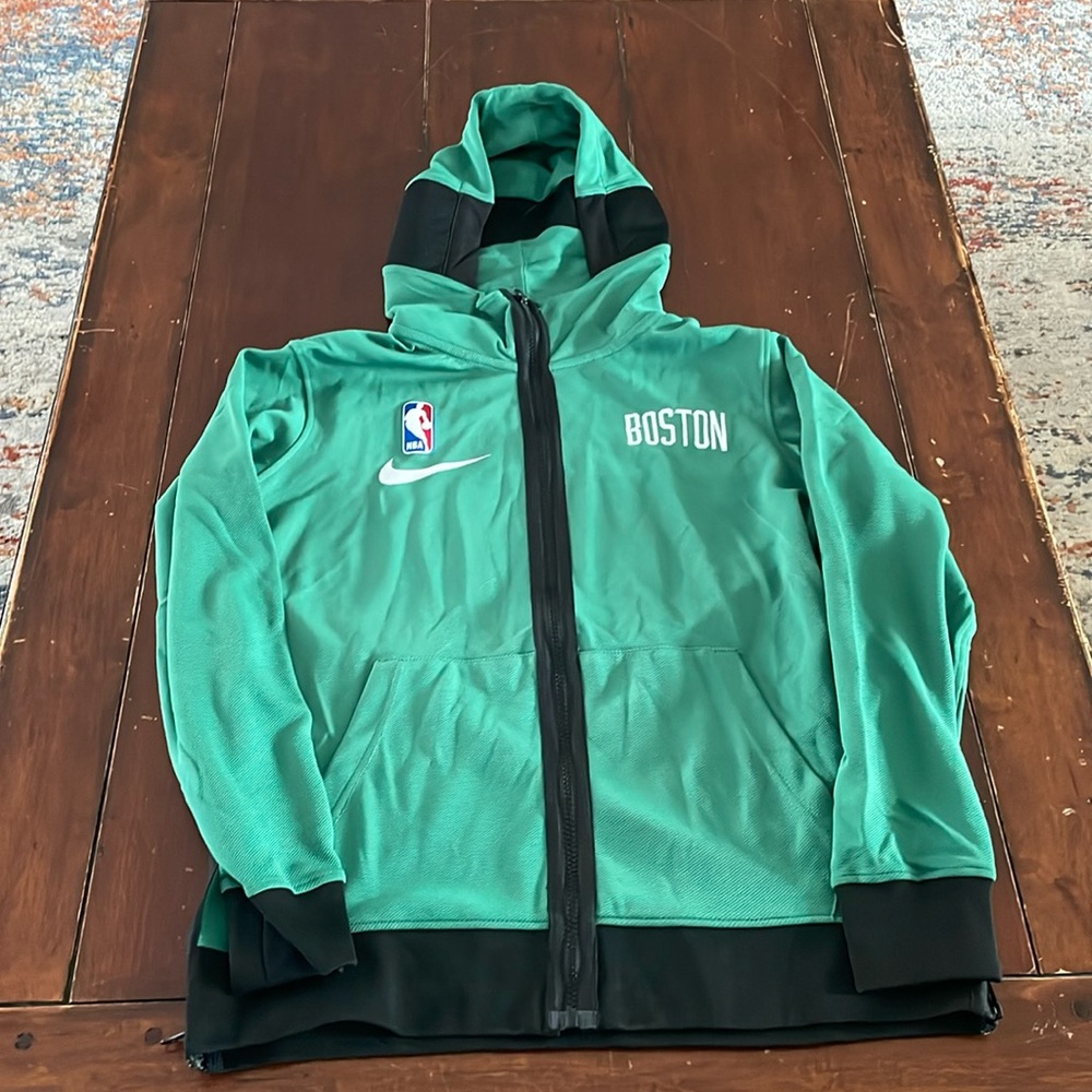 Nike Tech Boston Celtics hooded jacket.
